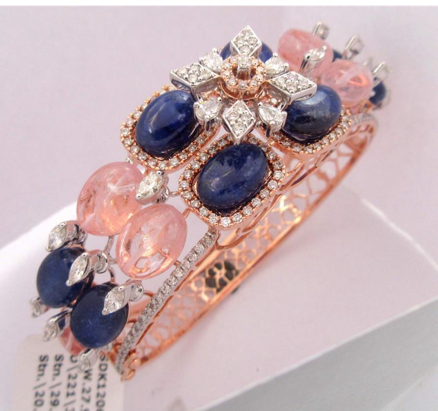 Stunning diamond braclet surrounded by sparkling fancy shape natural diamonds And tourmalines and tanzanite