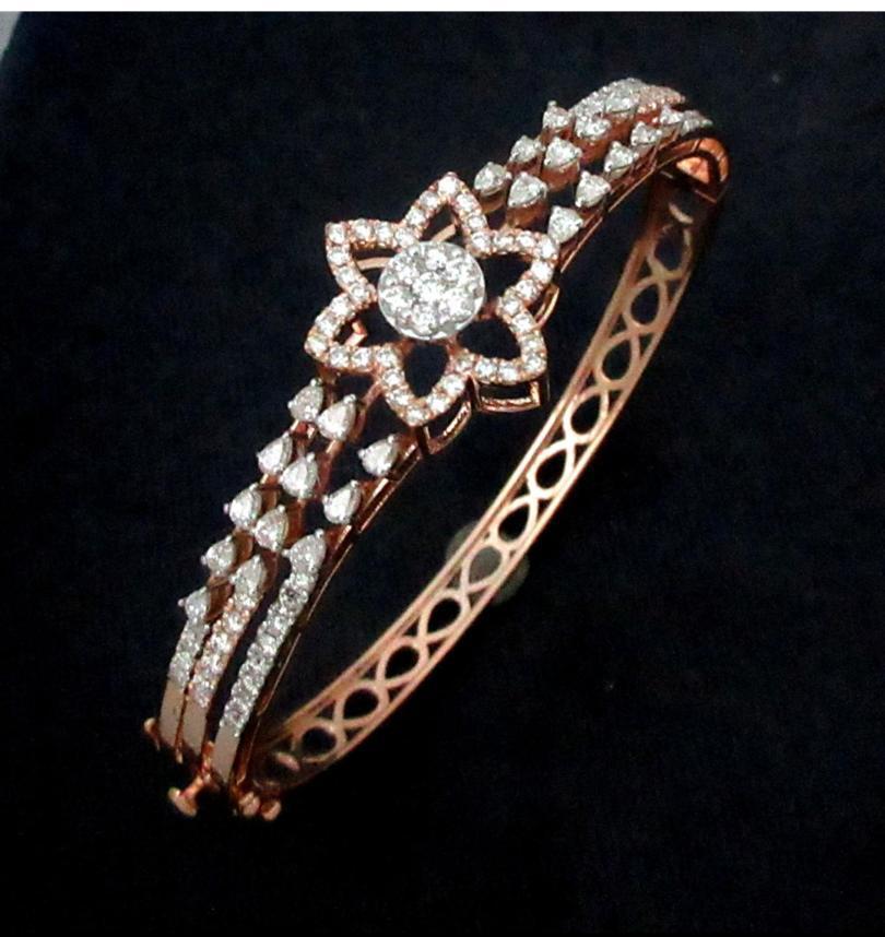 Stunning diamond braclet surrounded by sparkling fancy shape natural diamonds And tourmalines and tanzanite
