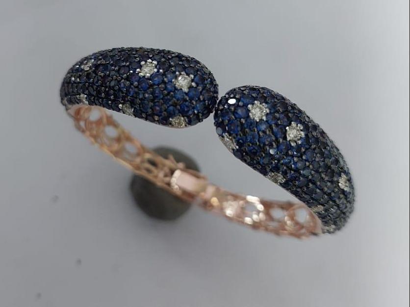 Vibrant sapphire  bracelet with sparkling  diamonds set in timeless 14kt gold