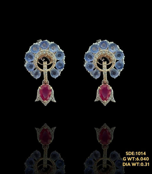 Classic 14kt gold earing with beautiful gemstones enhanced by dazzling natural diamonds